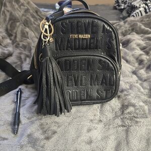 Steve Madden Black Embossed Mini Backpack with Tassel